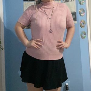 Pastel pink ribbed turtleneck top